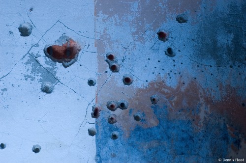 Bullet Holes in the Wall