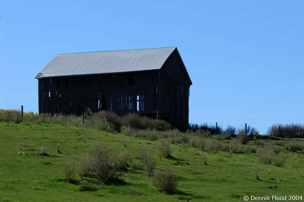 Wooden Barn on a Hill