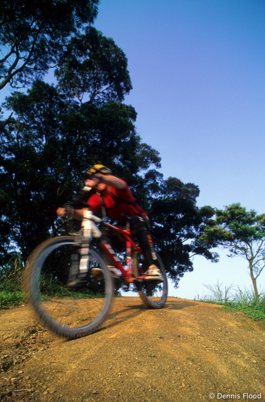 Speeding Red Biker