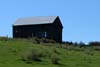 Wooden Barn on a Hill