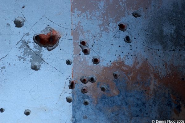 Bullet Holes in the Wall